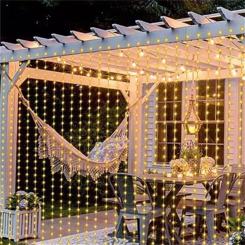 Outdoor solar curtain lights for patio decor, creating a warm, inviting ambiance.
