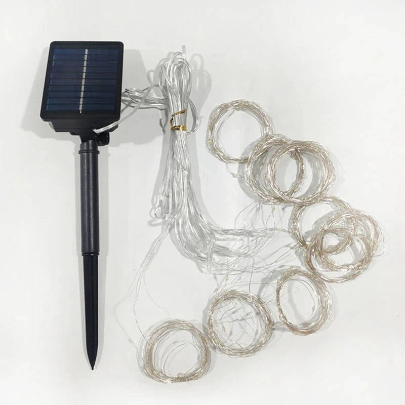 Festive outdoor solar curtain lights, perfect for garden, gazebo, or balcony decor.