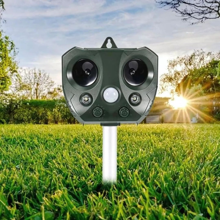 Outdoor ultrasonic bird & pest repeller, solar powered, weatherproof, motion sensor for humane garden protection.