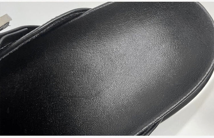 Edgy black platform sandals for women, featuring intricate stud details and a comfortable fit.