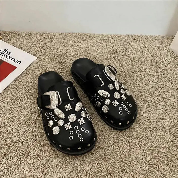 Comfortable black platform sandals for women, featuring a bold studded design.