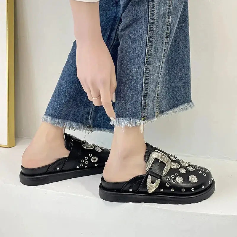 Stylish black studded platform sandals, a must-have for women's bold summer footwear.