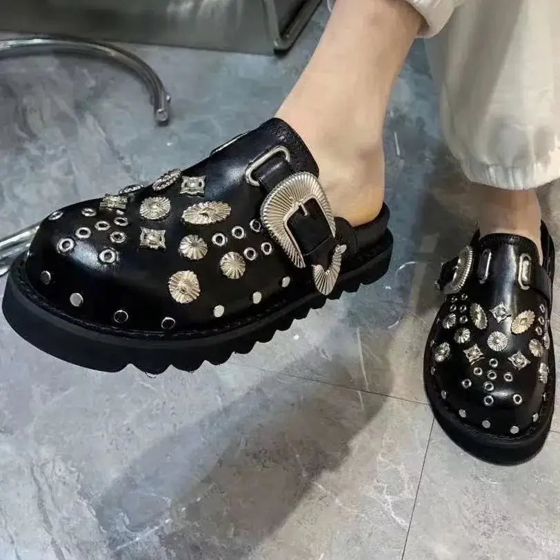 Women's fashion-forward studded platform sandals, blending punk style with comfort.