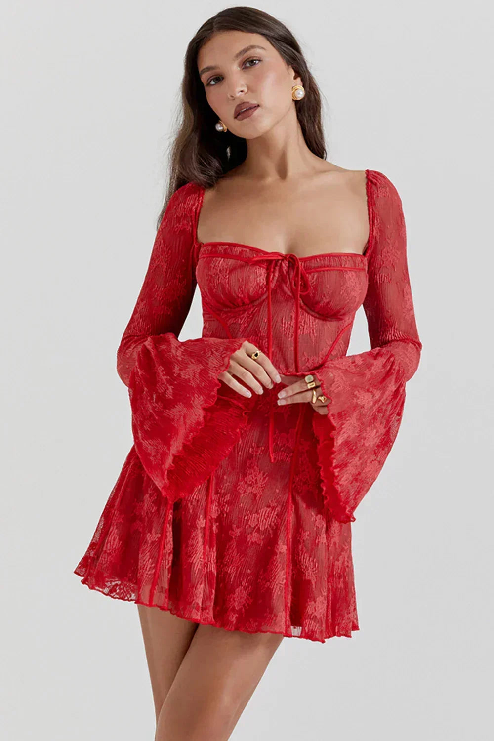 Red women's elegant lace mini dress with long sleeves. Versatile for parties, evening wear & special events.
