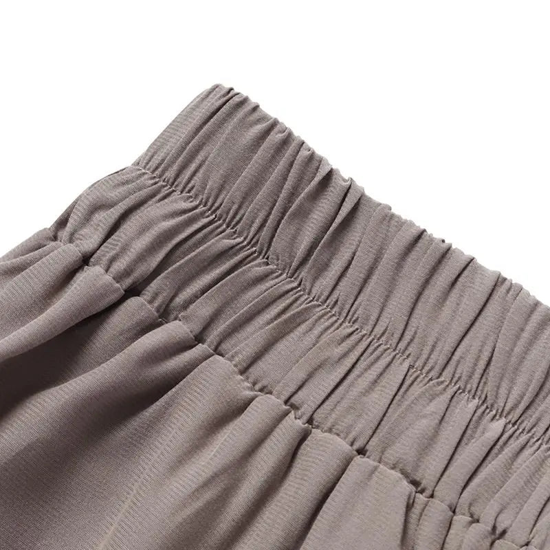 Women's plus-size wide-leg trousers, comfortable and stylish for office, work, and formal wear.