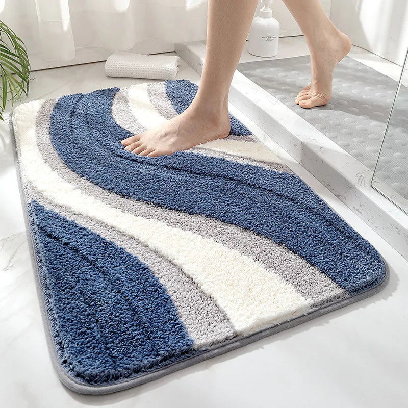 Plush microfiber bath rug, soft & absorbent, for spa comfort. Non-slip design, perfect bathroom decor.