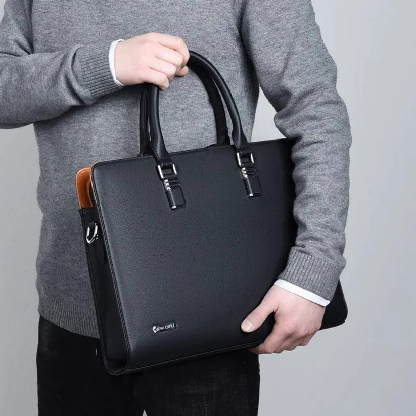 Stylish men's business messenger bag. Durable, organized work bag for 14-15 inch professional laptops.