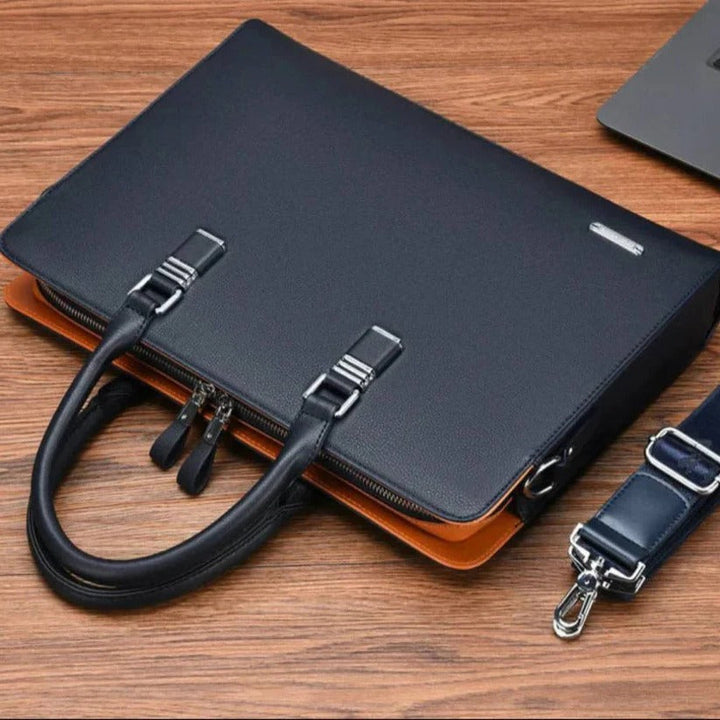 Durable men's work bag. Spacious messenger bag for 14-15 inch laptops, travel, and daily business.
