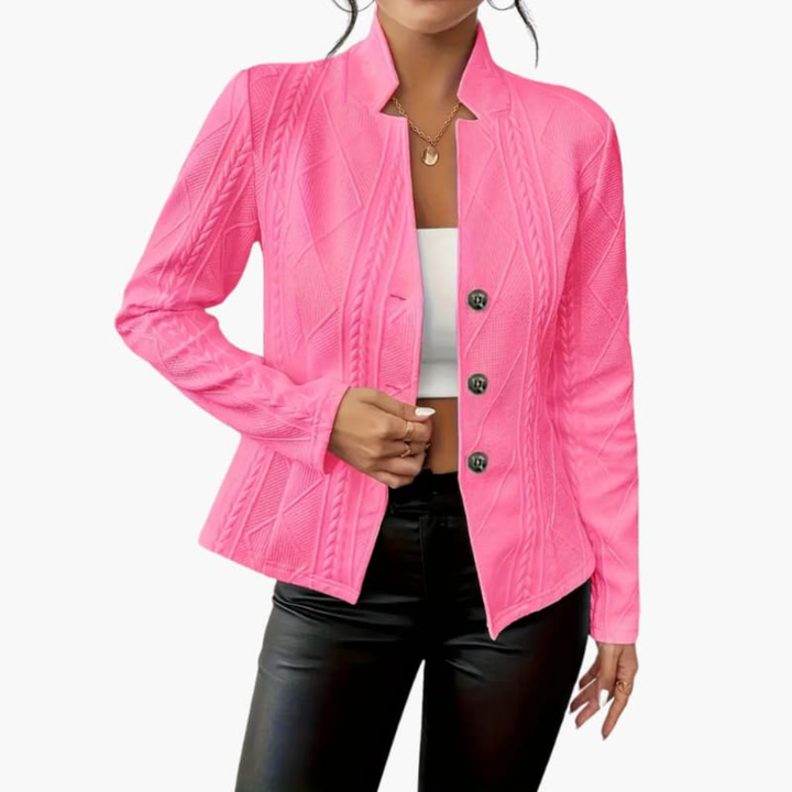 Tailored women's lapel blazer. Professional single-button jacket designed for sleek office and business attire.