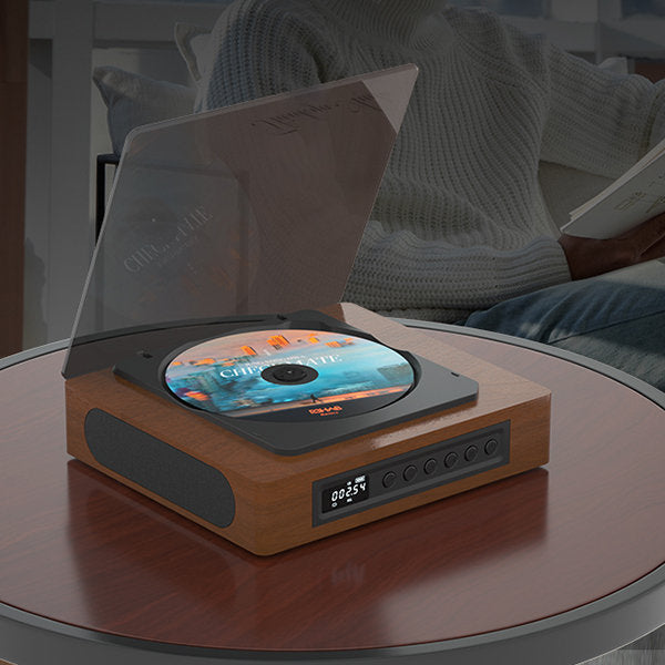 Stylish vintage Bluetooth CD player for music. Features USB-C, FM radio. Great retro audio electronics for home decor.