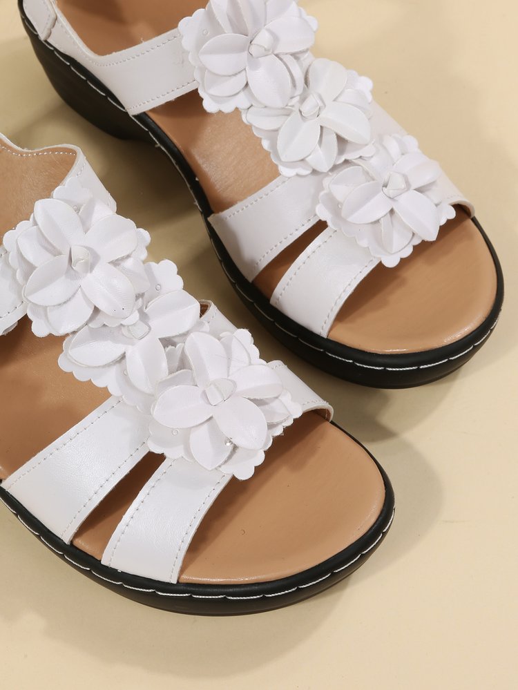 Classic retro women's summer sandals with a supportive wedge heel and orthopedic cushioning.