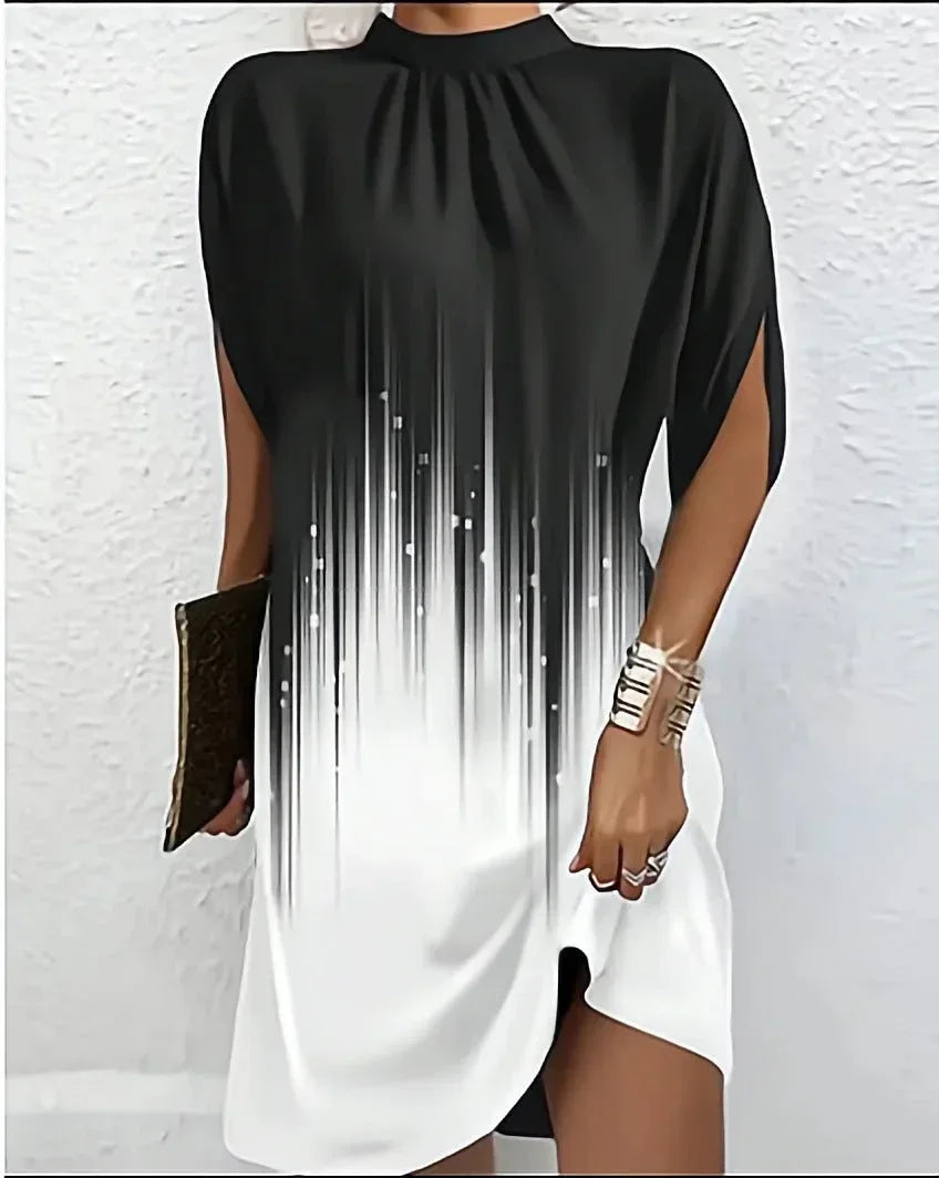 Stylish women's mock neck mini dress with statement cape sleeves, a key modern fashion piece.