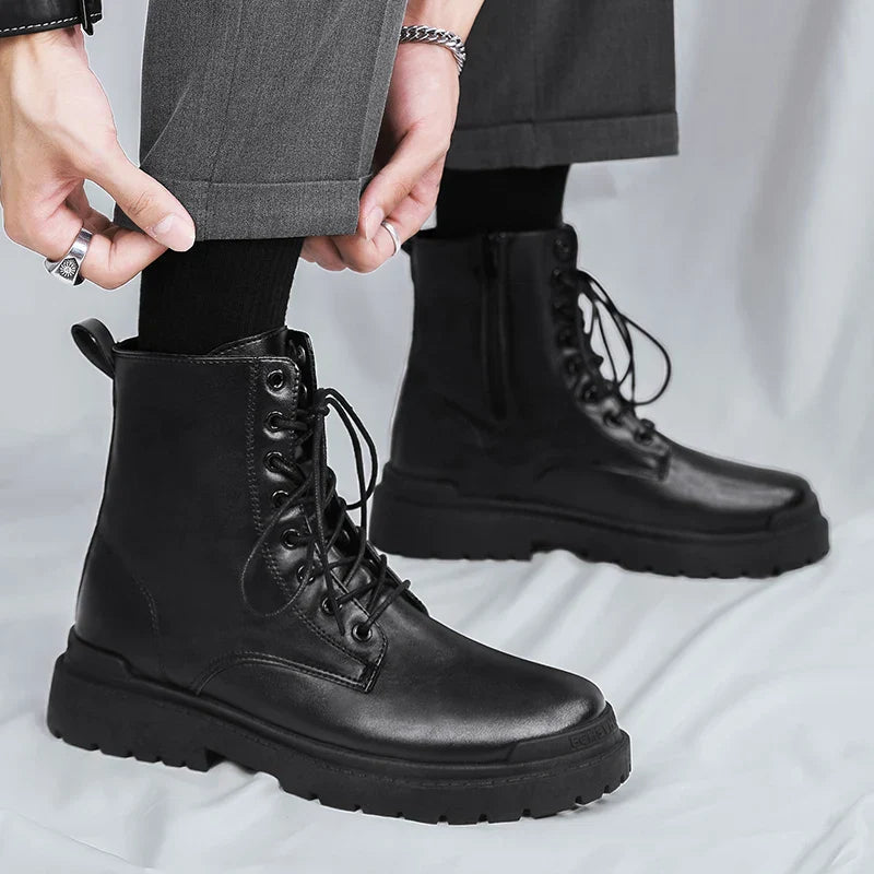 Rugged black combat boots for men, featuring lace-up and side zip. Durable ankle boots ideal for work & outdoor activities.