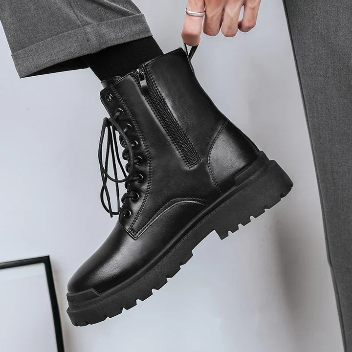 Stylish men's black combat boots. Features lace-up front, convenient side zipper, and durable rugged construction. Mens footwear.