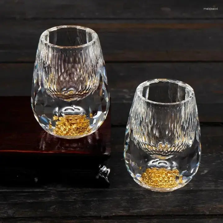 Six exquisite cut crystal shot glasses; premium barware for serving liquor, adds elegance to any party.