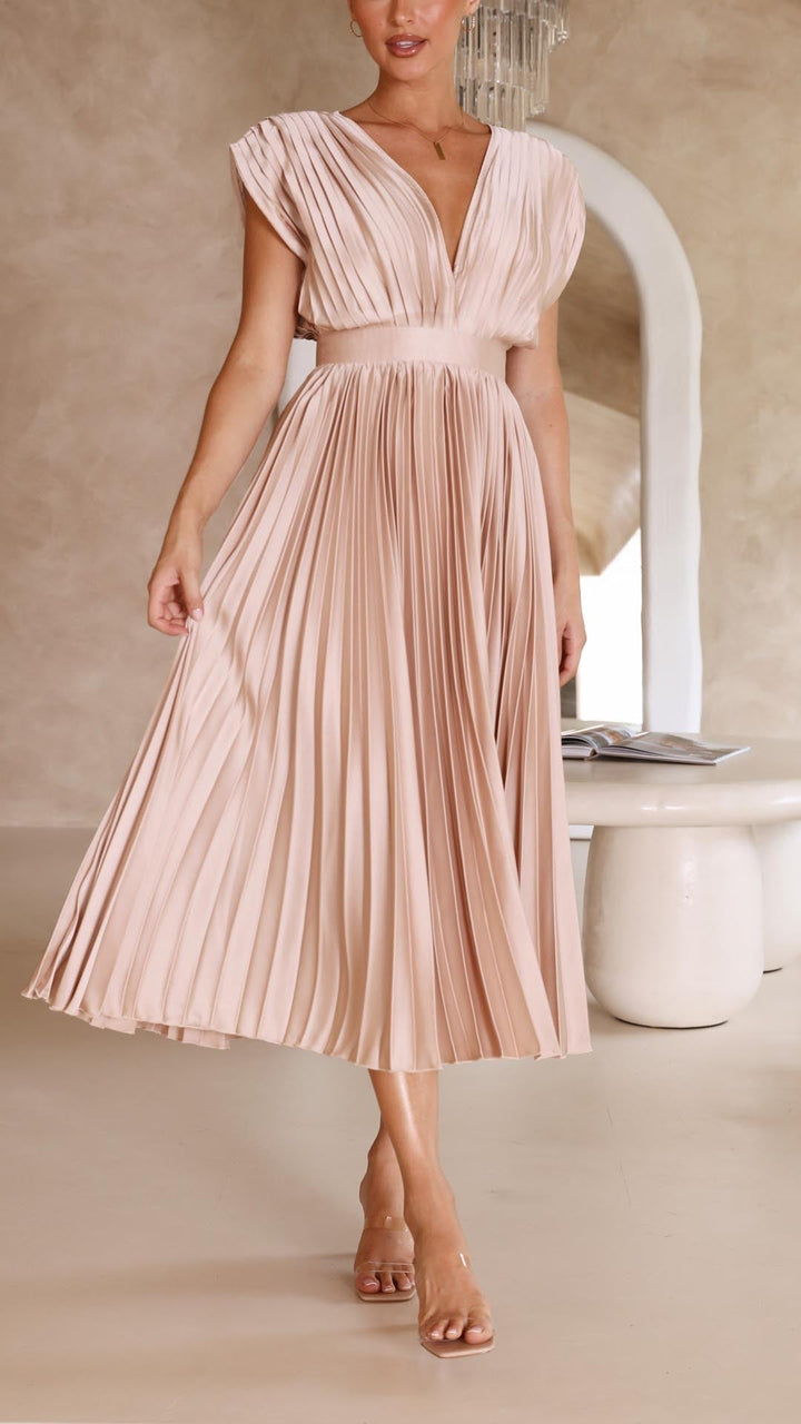 Silk pleated maxi dress with V-neck in rose red, featuring a high waist and elegant flowing pleats for a sophisticated look.