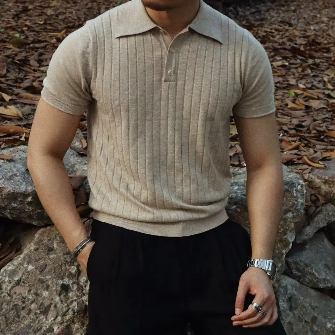 Contemporary men's slim fit polo with zipper, short sleeve, a versatile modern top.