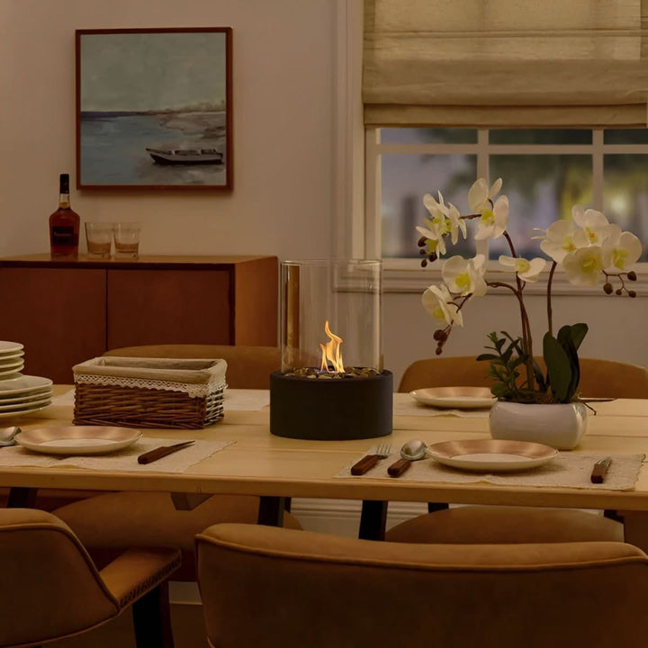 Sleek black smokeless tabletop fireplace, enhancing modern home decor with cozy lighting.