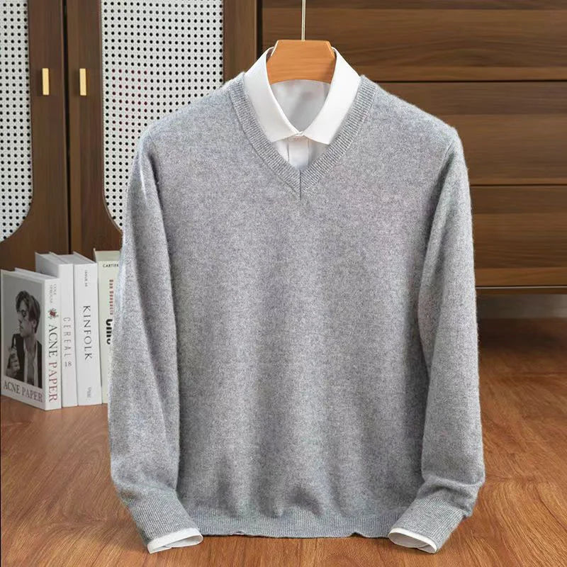 Chic women's V-neck sweater, a versatile long-sleeve knitwear top for casual or layered looks.