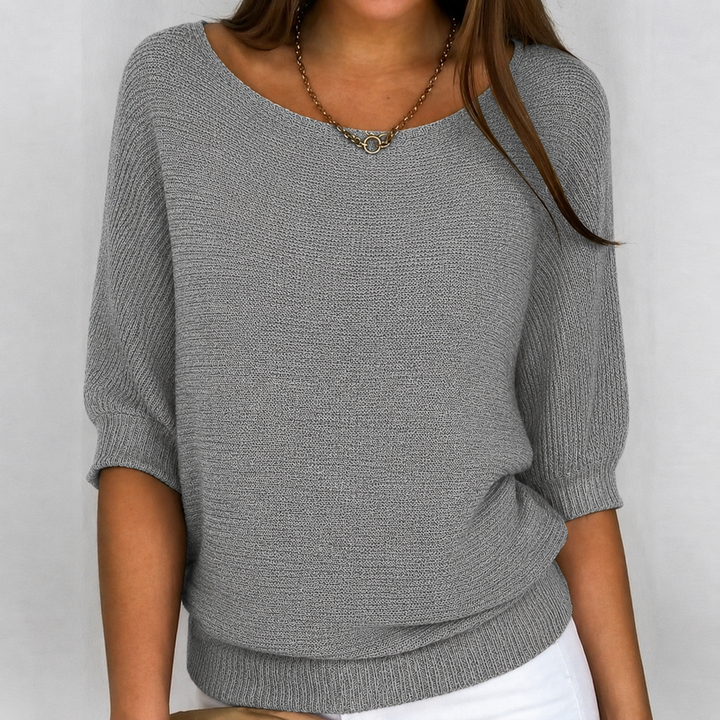 Soft knit women's 3/4 sleeve sweater in a relaxed fit, perfect for casual everyday comfort and versatile fall fashion.