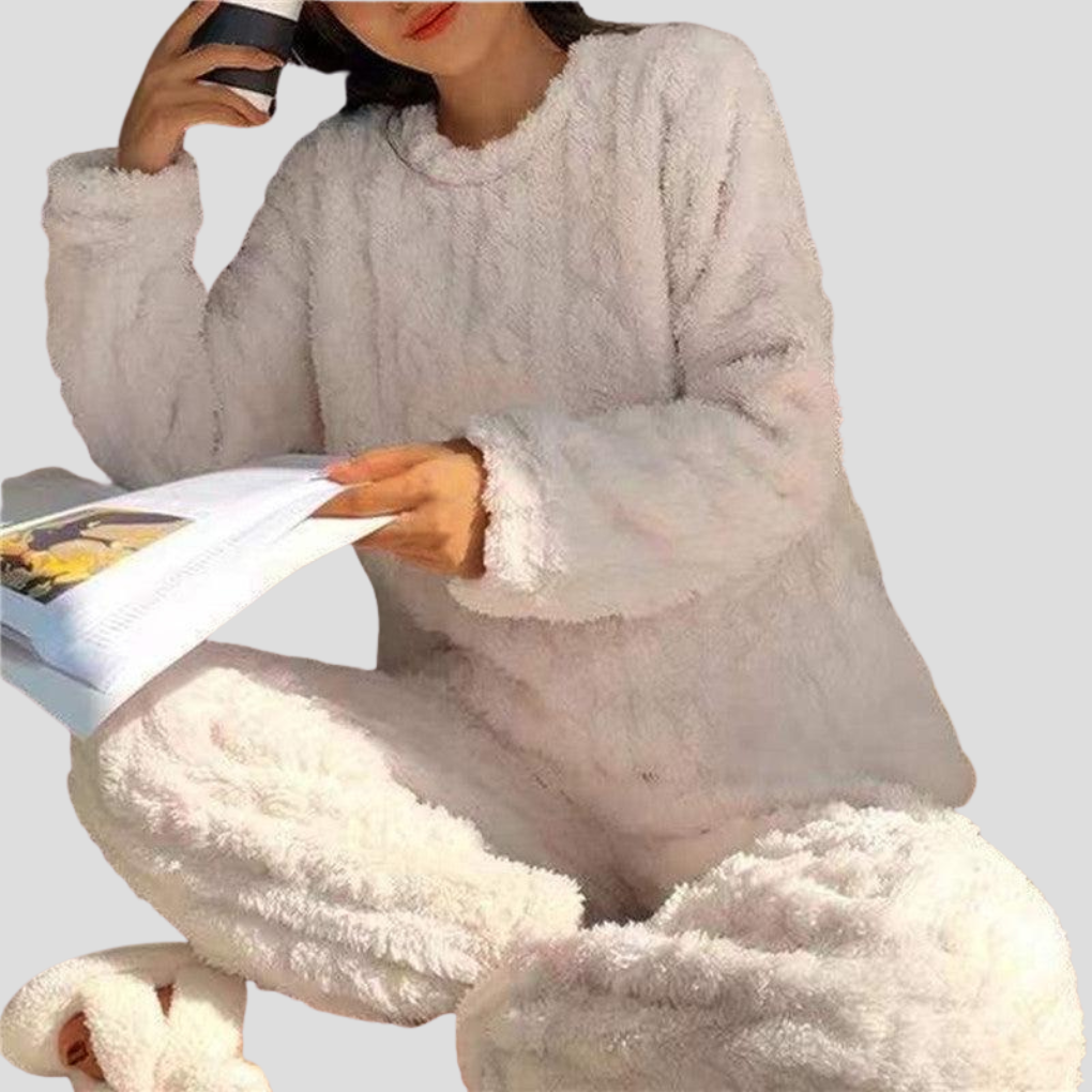 Cozy women's plush fleece pajama set, ideal for winter evenings and comfortable home loungewear and sleepwear.