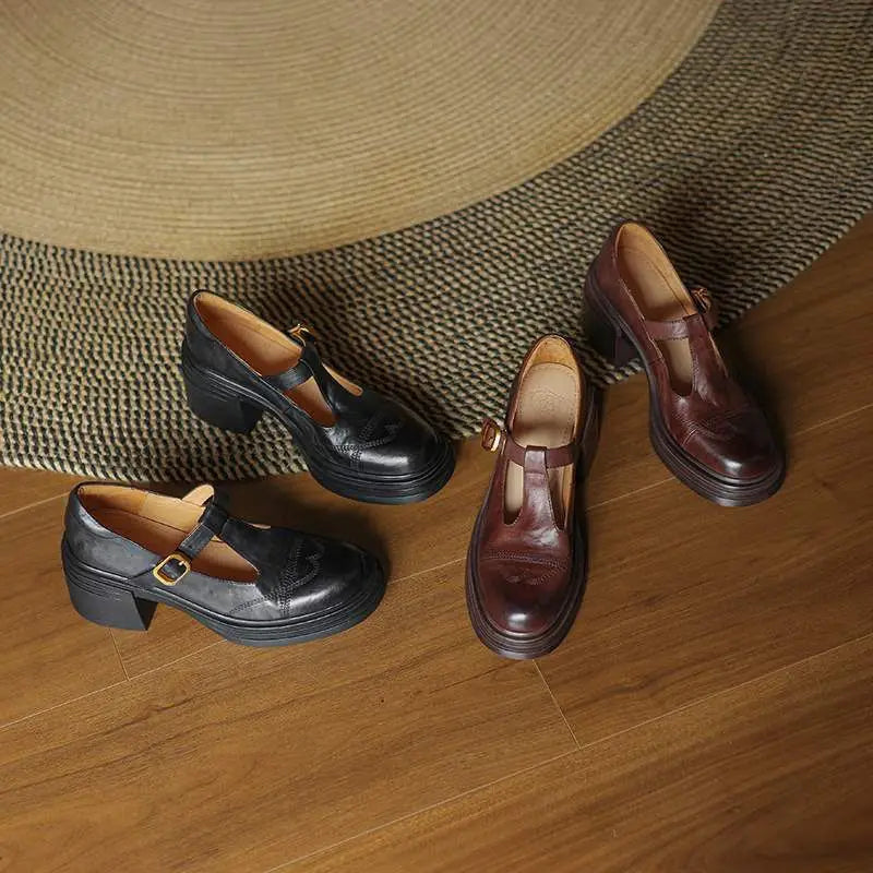 Elegant women's T-strap block heel shoes in smooth leather, a timeless and versatile footwear essential.