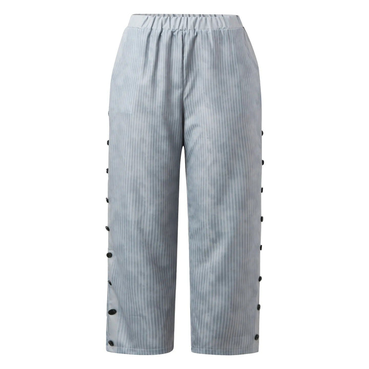 Stylish striped high-waist ladies pants with decorative buttons, perfect for a modern, versatile look.