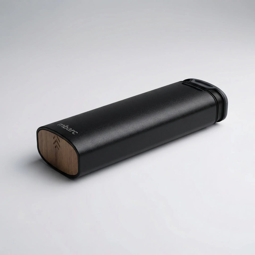 Daily medication planner: a 7-day pill box with sleek aluminum and natural wood design for health management.