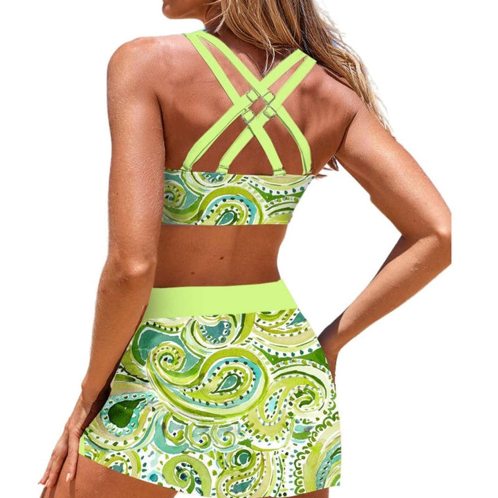 Elegant women's bikini top & bottom with a coordinated swim skirt for poolside fashion.