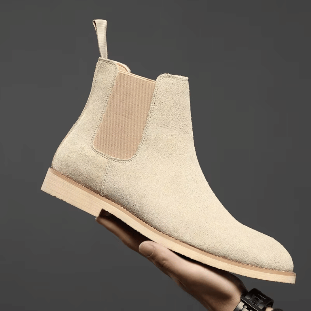 Stylish men's Chelsea boots, versatile for casual or formal wear. Comfortable slip-on footwear for any occasion.