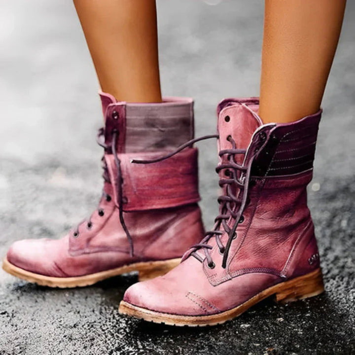 Stylish women's black lace-up combat boots, ankle-high & rugged for casual autumn/winter fashion