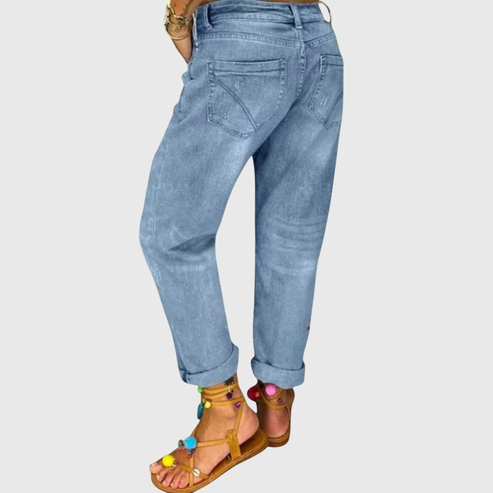 Classic blue denim baggy jeans for women, a stylish loose-fit choice for casual and everyday fashion. Comfortable.