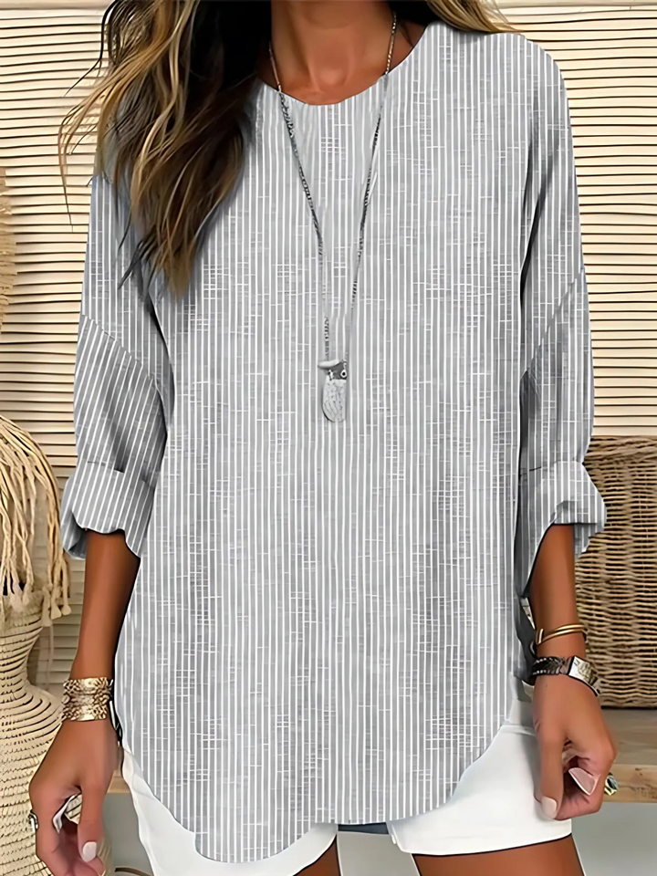 Elegant gray vertical stripe long sleeve women's blouse. Effortless style with a round neck, great for office.