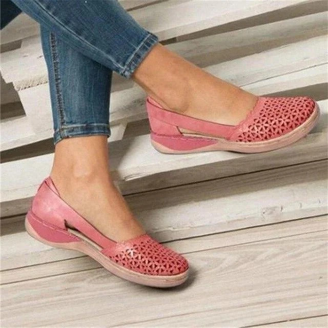 Comfortable women's flats in a sleek design, offering targeted bunion relief and arch support.