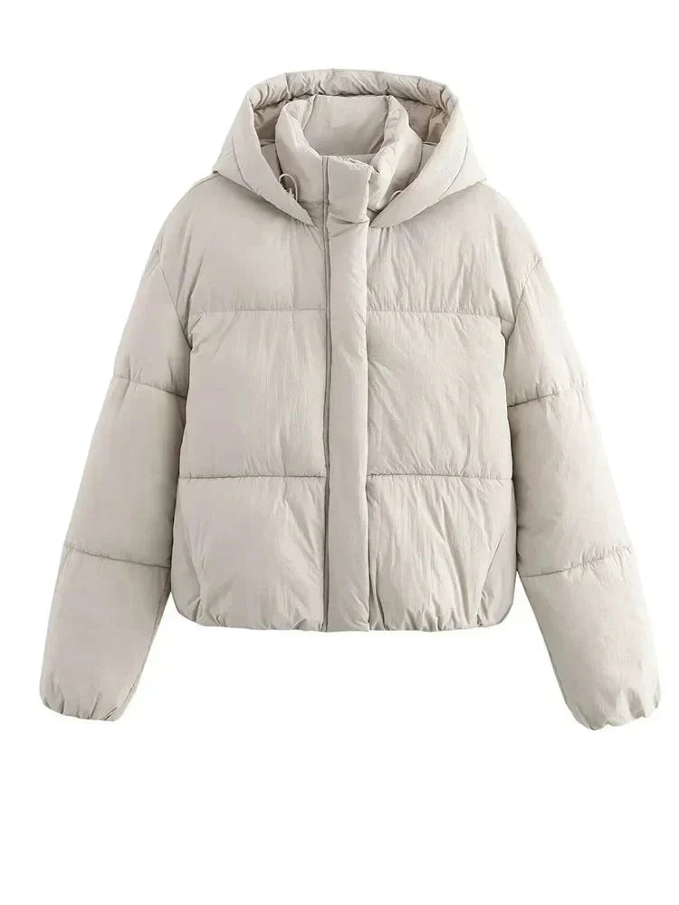 Casual women's cropped puffer jacket, insulated for warmth, shown in a vibrant color, ideal outerwear