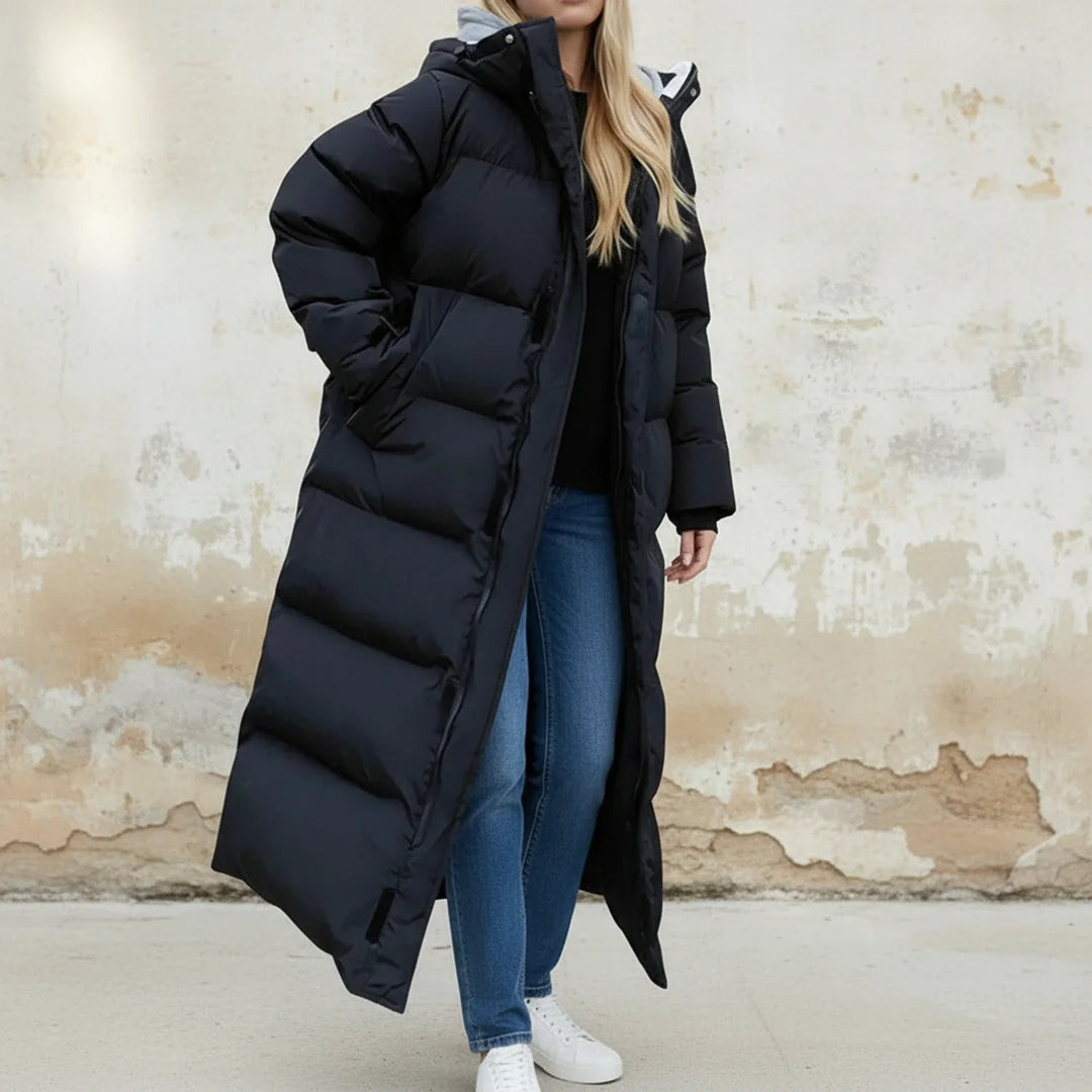 Stylish women's long puffer winter jacket with hood. Ultimate warmth for cold weather & daily commute outerwear.