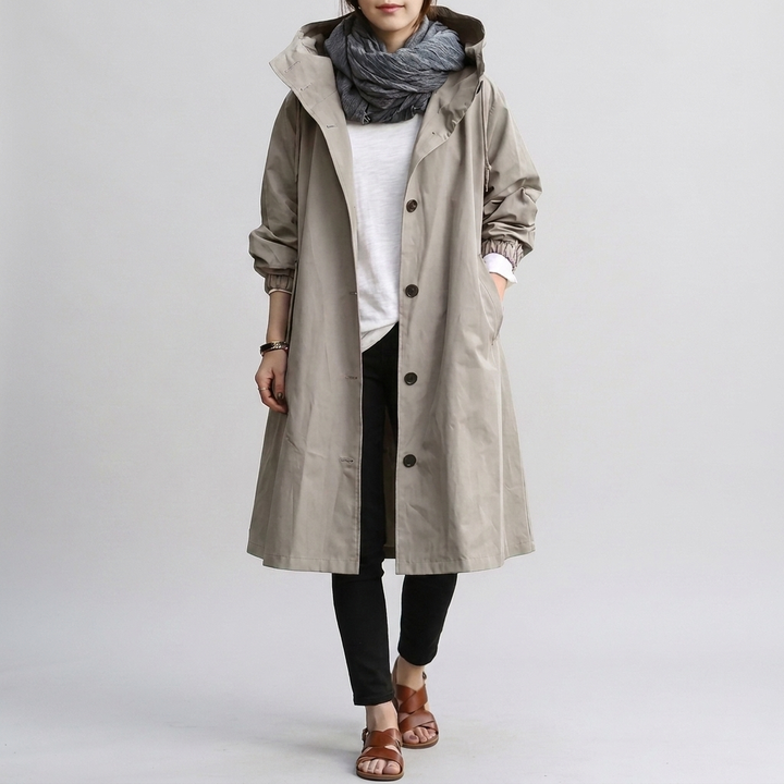 Casual women's oversized rain jacket in a neutral color, perfect for spring/fall layering & everyday wear.