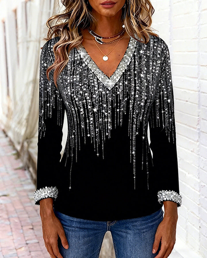 Elegant women's V-neck long sleeve top with a vibrant print. Great for stylish everyday fashion.