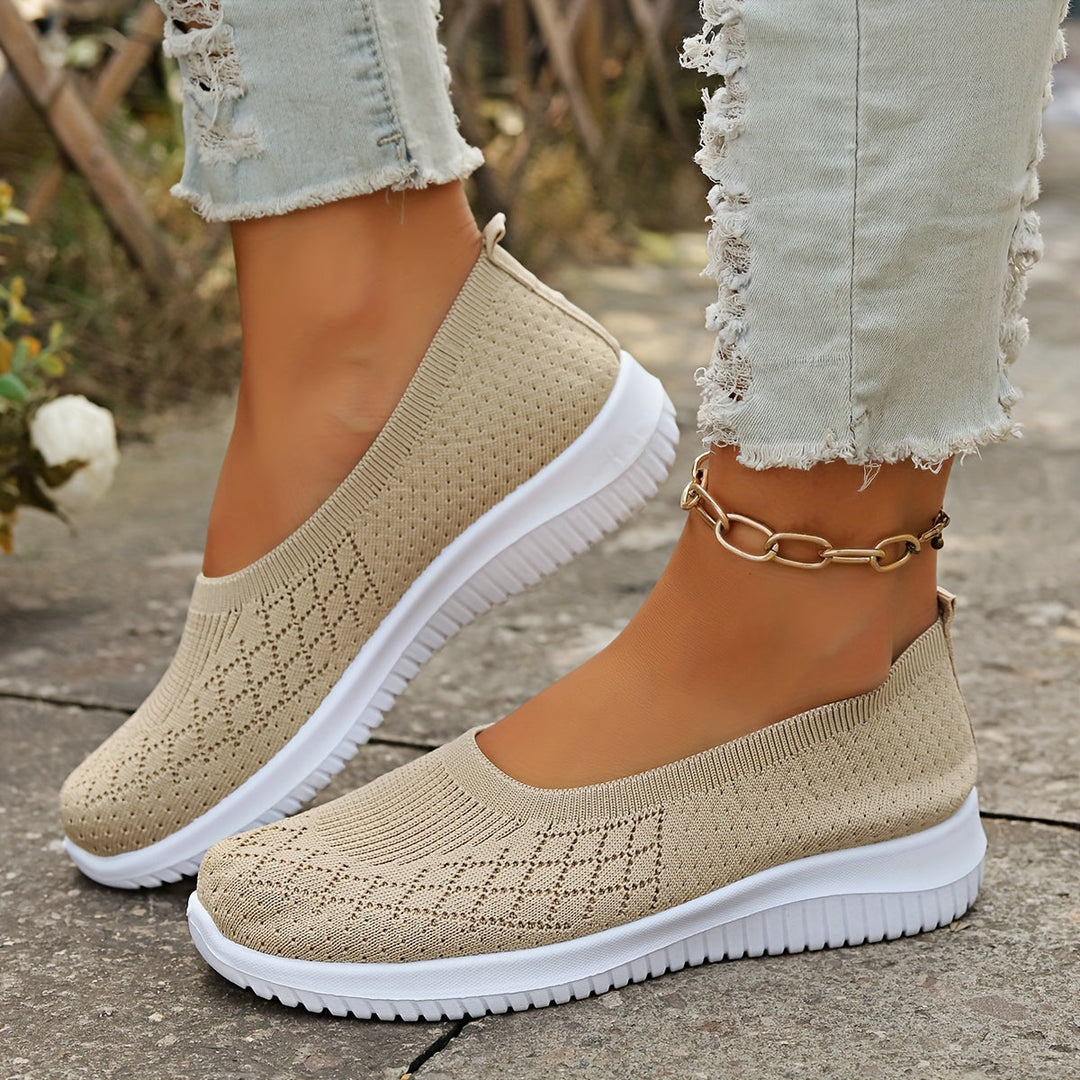 Comfortable women's slip-on footwear in a sleek design, ideal for casual fashion & easy wear. Stylish everyday shoes.