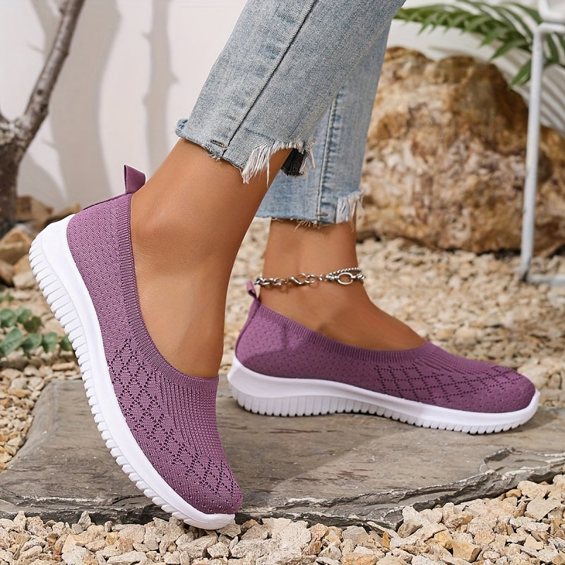 Soft-textured women's slip-on shoes, providing comfortable & stylish casual footwear. Perfect for easy, everyday wear.