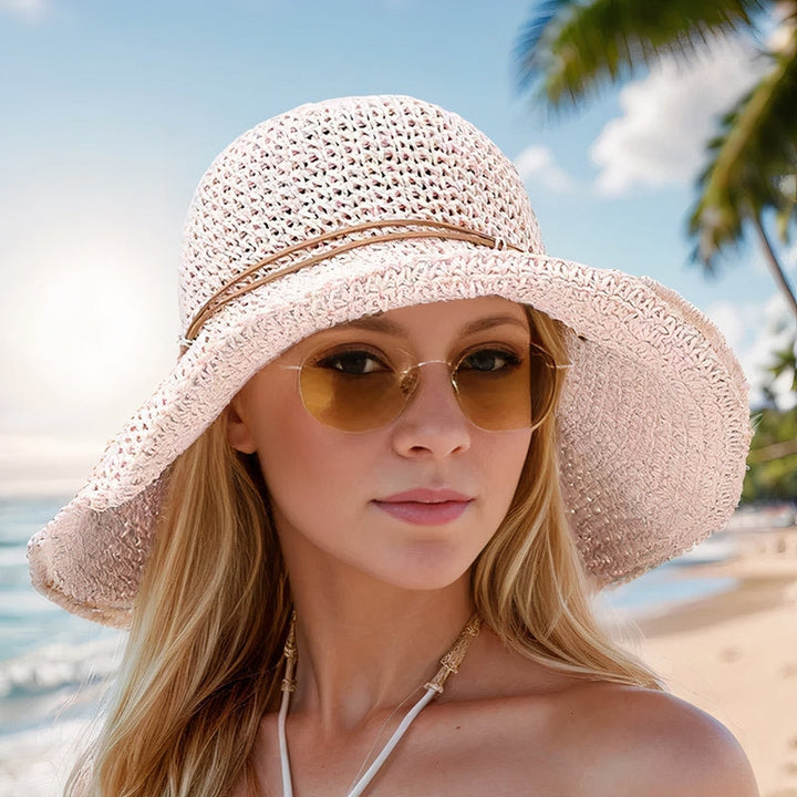 Beautifully woven wide brim straw sun hat for women, an essential summer fashion accessory & UV protector.