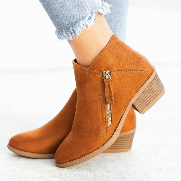 Comfortable women's ankle boots, ideal for fall & winter fashion. Features supportive design & easy wear.