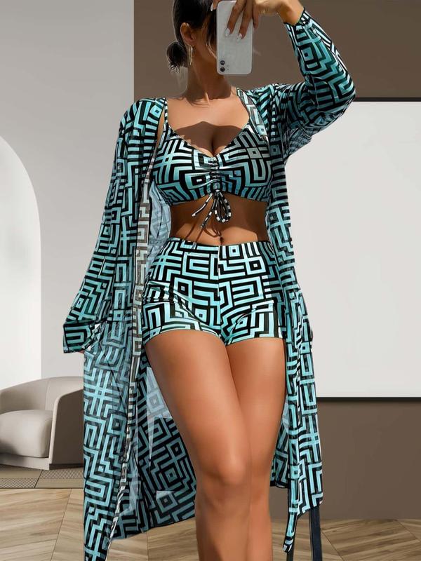 Complete women's 3-piece swimsuit & cover-up set for stylish beach days. Trendy bikini with matching shorts.