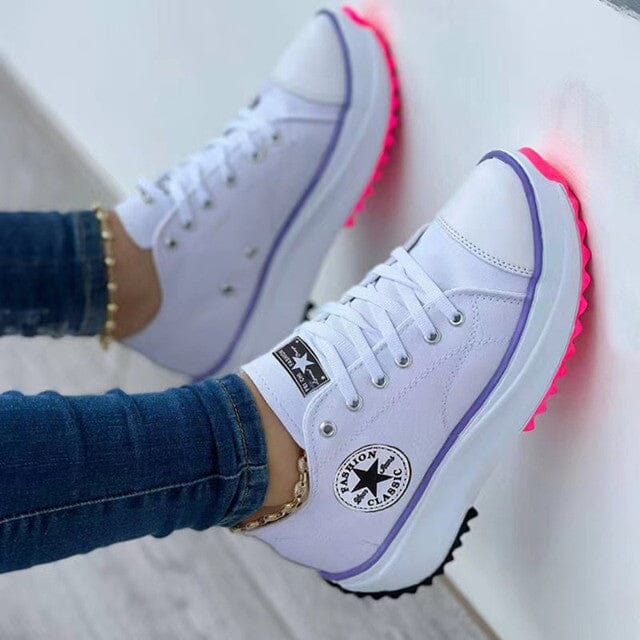 Trendy women's low-top sneakers with a stylish chunky sole, perfect for everyday comfort and street style.