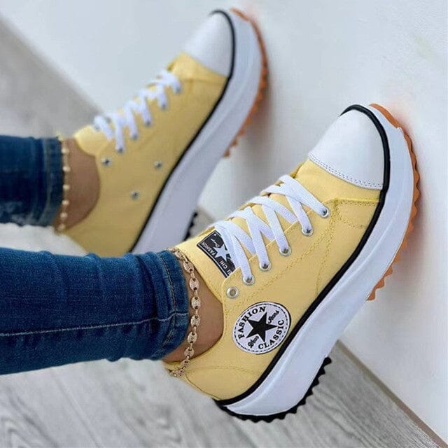 Versatile women's low-top sneakers with a trendy chunky platform sole, great for all-season casual fashion.