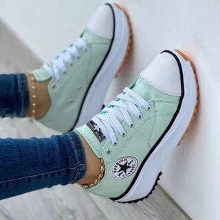Modern women's chunky sole sneakers, blending fashion footwear with essential everyday comfort and street style.