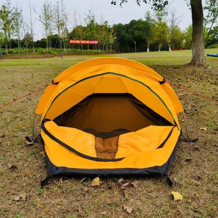 Army green ultralight solo tent, waterproof and windproof, ready for challenging backpacking & hiking trips.