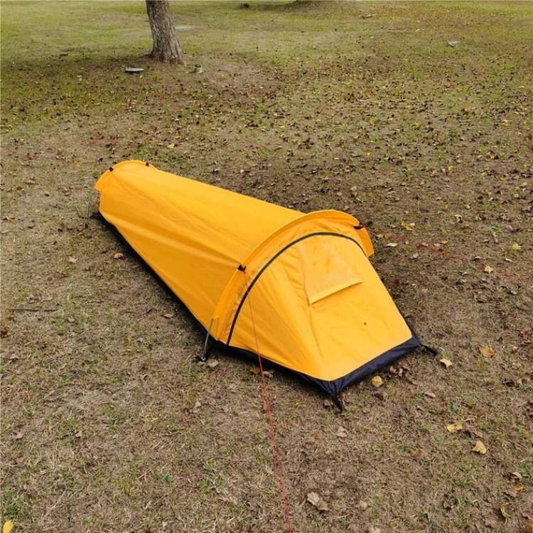 Ultralight solo backpacking tent in its compact stuff sack; essential, portable hiking gear for any adventure.
