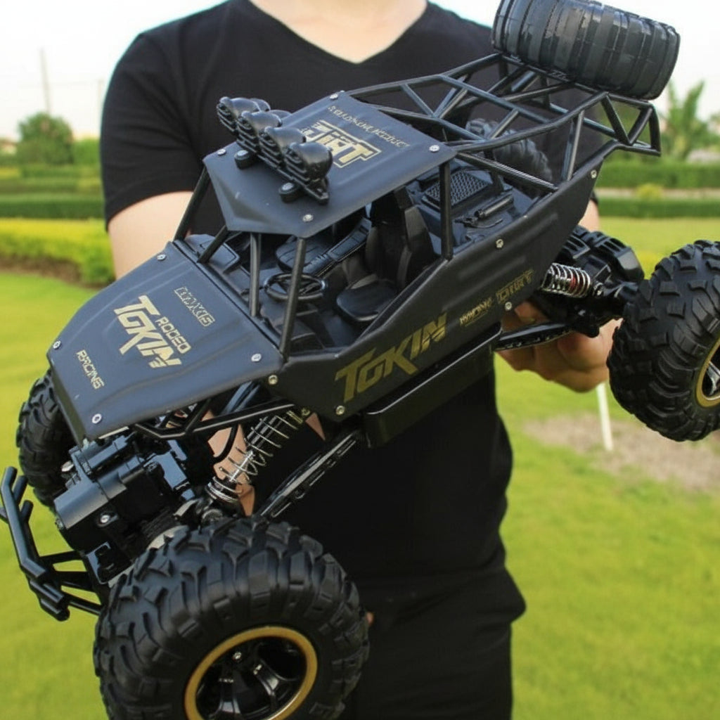 Unisex 4WD remote control off-road truck tackling rough terrain; electric RC monster crawler for outdoor play.