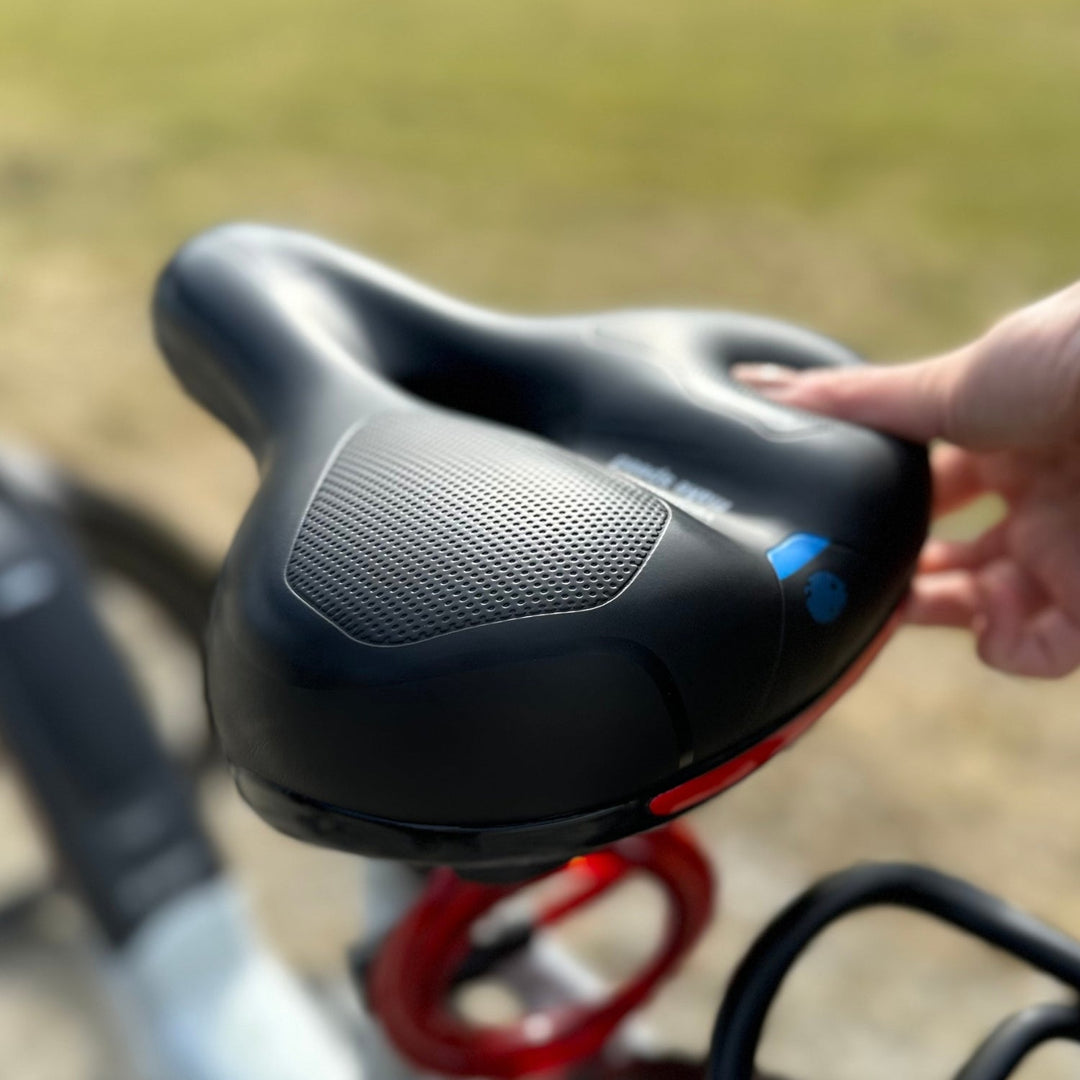 Advanced CloudComfort Pro unisex bicycle seat featuring breathable memory foam & shock absorption for superior cycling.
